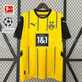 Borussia Dortmund yellow home jersey with black short sleeves, thin vertical stripes and 1&1 sponsor, alongside Bundesliga, UCL and UEFA Foundation graphics.
