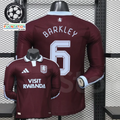  Front and back views of a claret Aston Villa long-sleeve jersey with a light blue collar, light blue Barkley number 6 print and Visit Rwanda sponsor.
