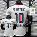 Front and back views of a white Bayern Munich short-sleeve away jersey with a navy collar, burgundy trim and navy Musiala number 10 print.