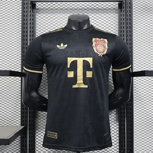 Front view of a black Bayern Munich 125th anniversary short-sleeve jersey with a gold anniversary crest, gold sponsor logo and gold sleeve trim.