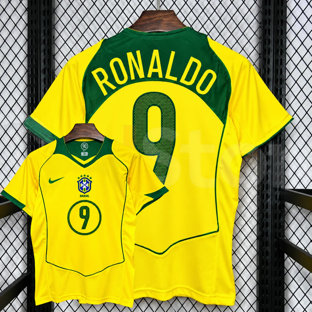 Front and back views of a yellow Brazil retro short-sleeve home jersey with green trim, yellow Ronaldo lettering on a green upper back panel and green number 9 print.
