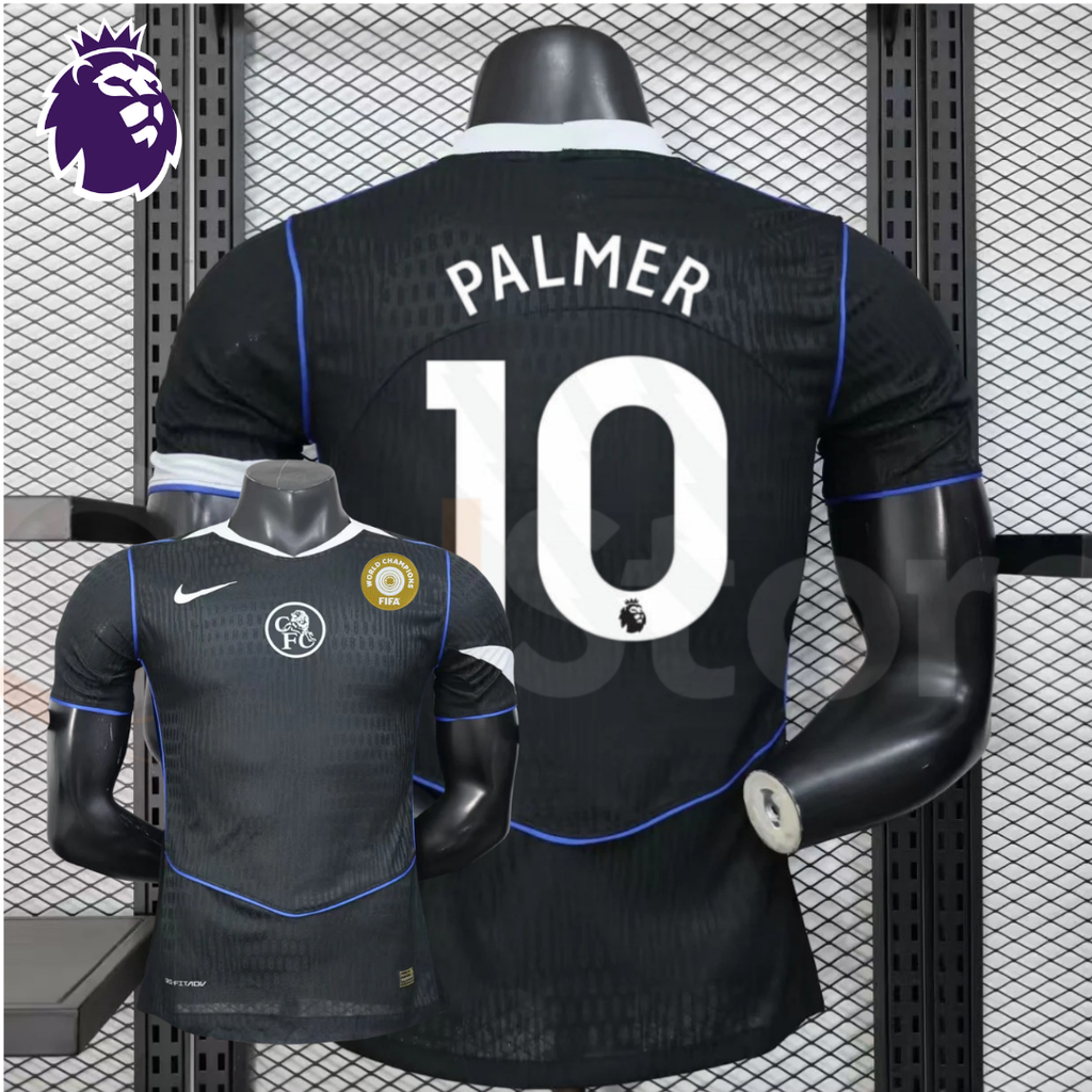  Front and back views of a black Chelsea FC short-sleeve third jersey with blue piping, white Palmer number 10 print and a gold FIFA World Champions chest badge.