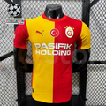 Front view of a red and yellow Galatasaray short-sleeve home jersey with the club crest, Turkish flag emblem and white Pasifik Holding sponsor.