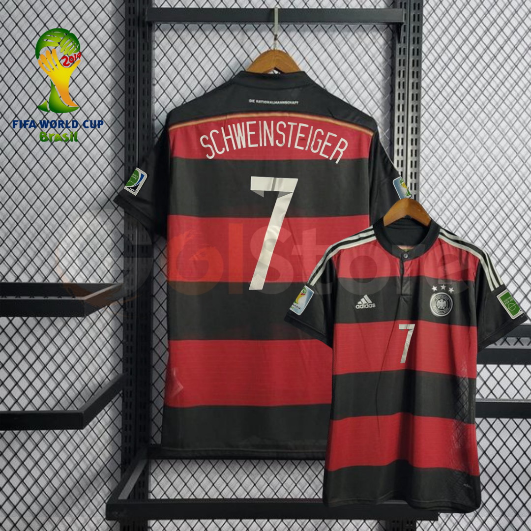 Front and back views of a red and black striped Germany 2014 short-sleeve away jersey with Schweinsteiger number 7 print and World Cup sleeve patches.