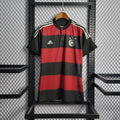 Front view of a Germany 2014 retro short-sleeve away jersey with red and black horizontal stripes, light shoulder stripes and the German football crest.