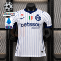 Front view of a white Inter Milan short-sleeve jersey with thin blue pinstripes, blue collar and cuffs, club crest and Betsson Sport sponsor, alongside UCL and Serie A graphics.