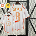 Front and back views of a white Netherlands 2004 away retro short-sleeve jersey with orange trim, Davids number 8 print, and EURO and UEFA Fair Play graphics.