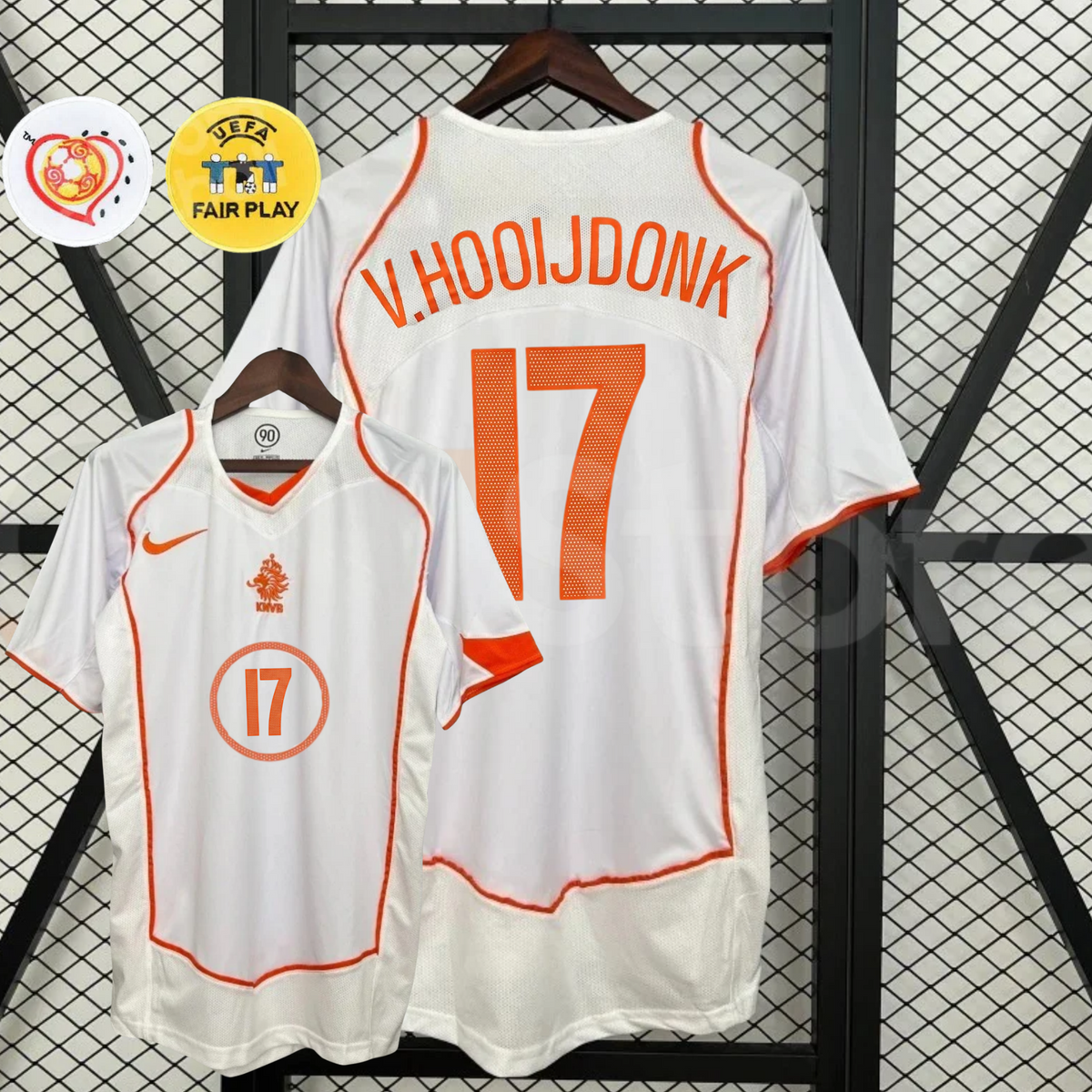 Front and back views of a white Netherlands 2004 away retro short-sleeve jersey with orange trim, V. Hooijdonk number 17 print, and EURO and UEFA Fair Play graphics.