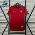 Front view of a red Portugal retro short-sleeve home jersey with a green collar, green sleeve trim, yellow accents and Portugal crest.