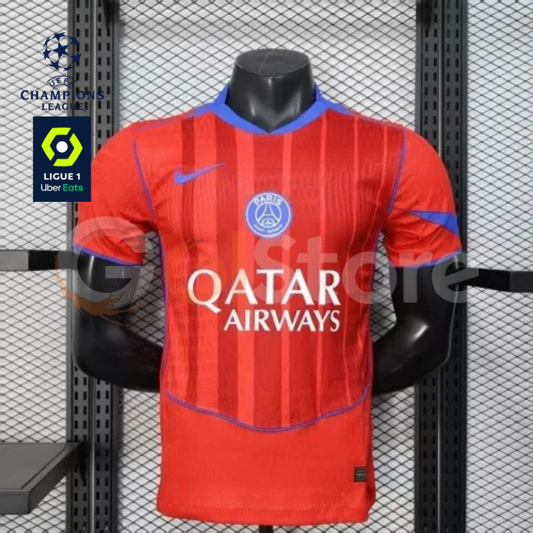 Front view of a red PSG short-sleeve jersey with tonal vertical stripes, blue trim, a central club crest and Qatar Airways sponsor, alongside UCL and Ligue 1 graphics.